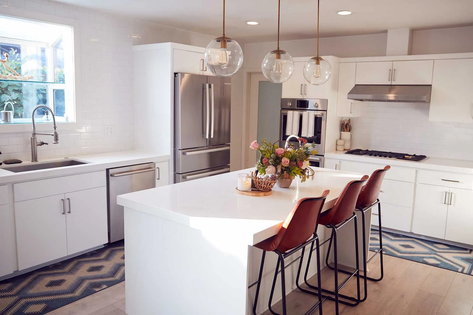 A bright modern kitchen with the kind of refrigerator, dishwasher and range we keep running for Cleveland-area homes