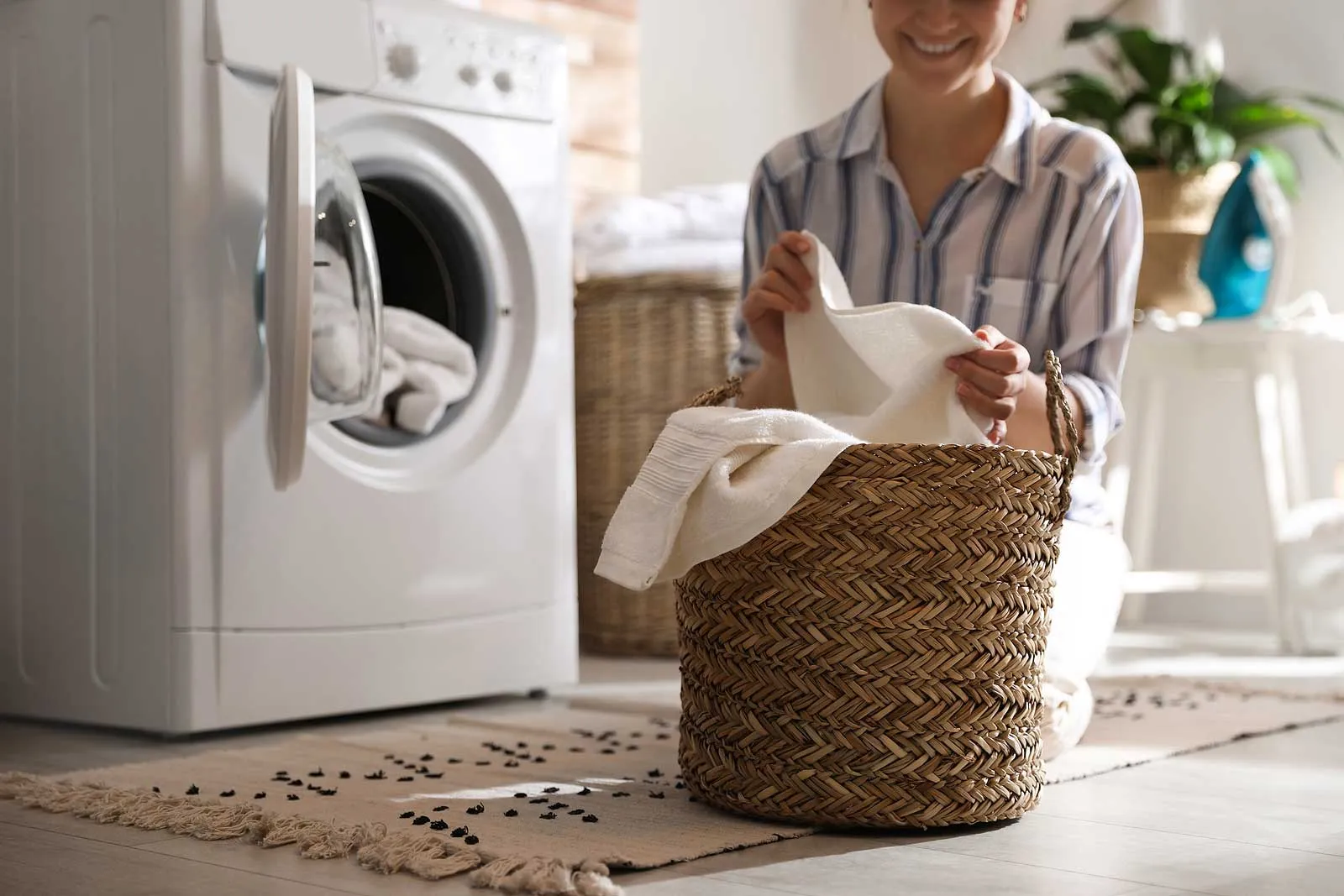 A washing machine running in a bright home laundry room, the kind of everyday appliance we get back up and running